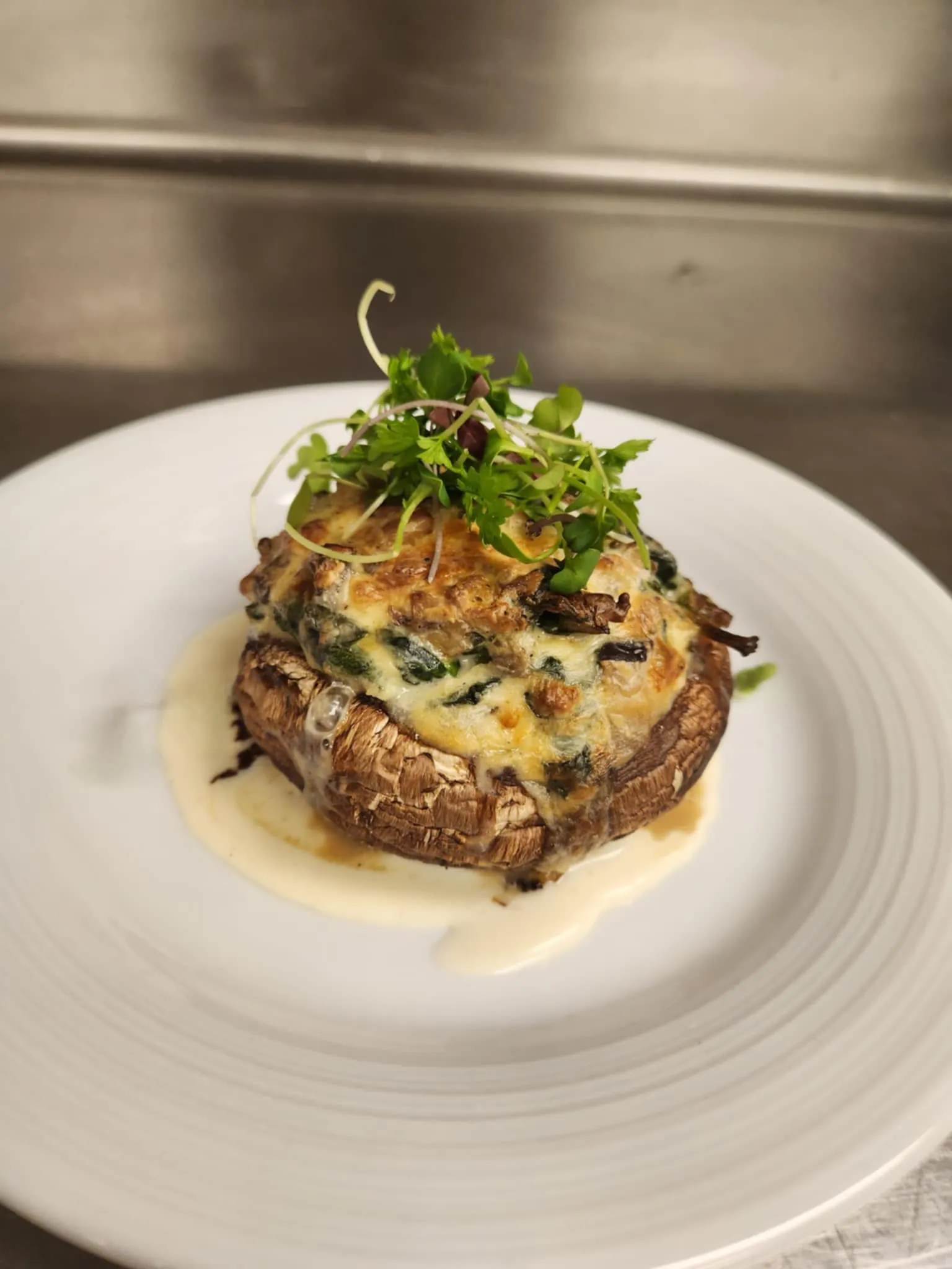 A photo of Stuffed Portobello